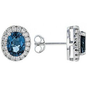 London blue Topaz Rhodium over SS earrings 3.18ctw